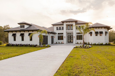 Example of an eclectic exterior home design in Orlando