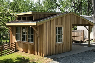 This is an example of a medium sized rustic house exterior in Louisville.