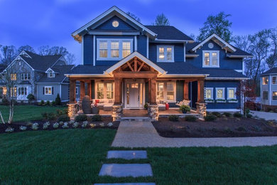 Mid-sized craftsman blue two-story wood exterior home idea in Richmond with a shingle roof