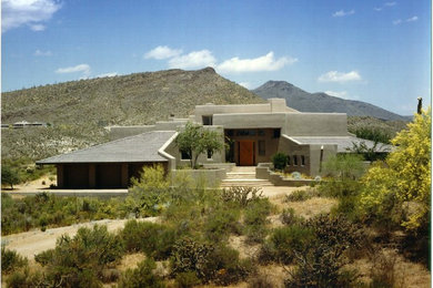 Contemporary gray two-story mixed siding exterior home idea in Phoenix