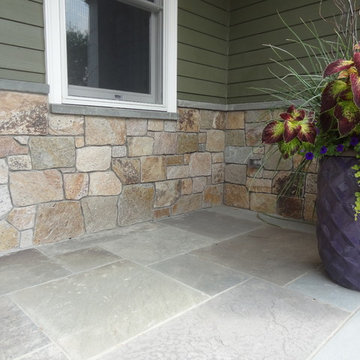 Combining Colonial Tan Natural Stone with Olive Green Siding