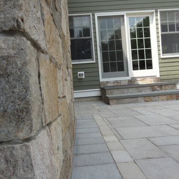 Combining Colonial Tan Natural Stone with Olive Green Siding