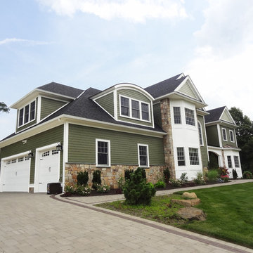 Combining Colonial Tan Natural Stone with Olive Green Siding
