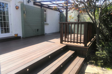 Composite Decking with Pergola , Trellis Screening and up lighters to deck