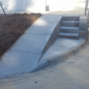 Concrete step with ramp