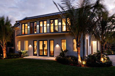 Inspiration for a world-inspired house exterior in Miami.