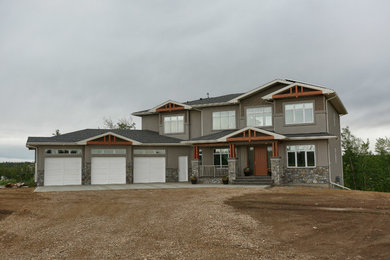 Inspiration for a large and gey contemporary two floor render house exterior in Edmonton.