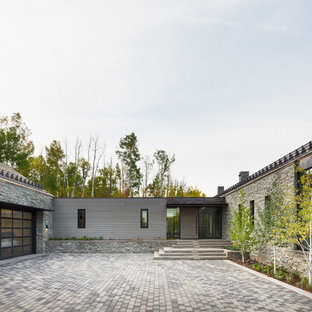 Contemporary gray one-story mixed siding exterior home idea in Denver