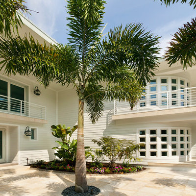 Huge contemporary white two-story concrete fiberboard exterior home idea in Tampa