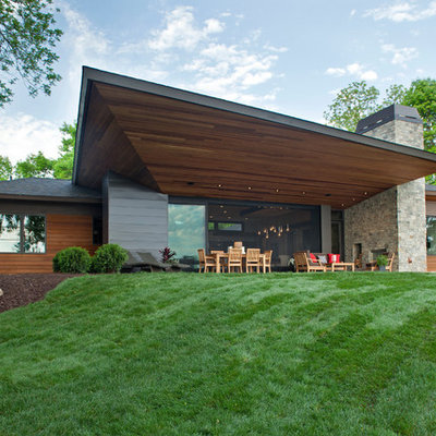 Example of a trendy mixed siding exterior home design in Minneapolis