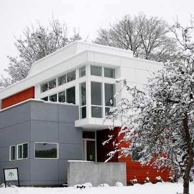Mid-sized contemporary multicolored two-story mixed siding gable roof idea in Seattle