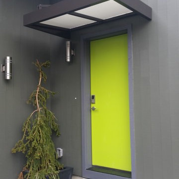 Contemporary flat metal door awning