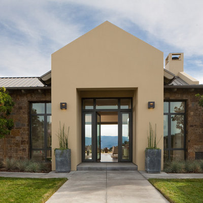 Example of a trendy stone exterior home design in Santa Barbara