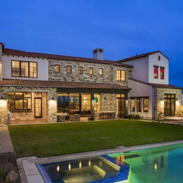 Contemporary Italian Farmhouse by John Siemering Homes Austin TX