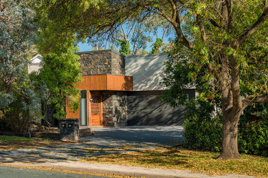 This is an example of a world-inspired house exterior in Canberra - Queanbeyan.