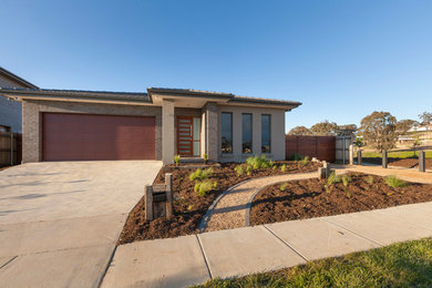 Beige modern bungalow brick house exterior in Canberra - Queanbeyan.
