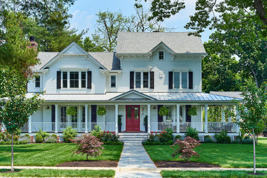 Inspiration for a timeless white two-story exterior home remodel in New York with a shingle roof