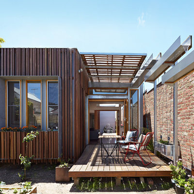Trendy one-story mixed siding exterior home photo in Melbourne