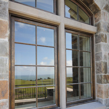 Copper Clad Windows with Stone Trim