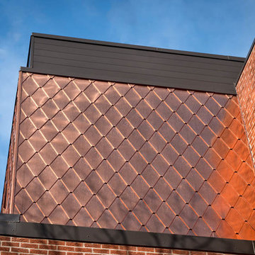 Copper Diamond tile on residential urban house