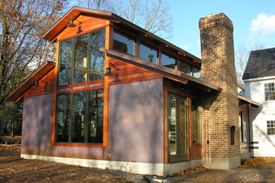 Example of a farmhouse exterior home design in Philadelphia