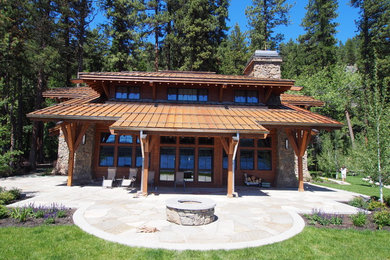 Example of a mountain style brown metal exterior home design in Phoenix