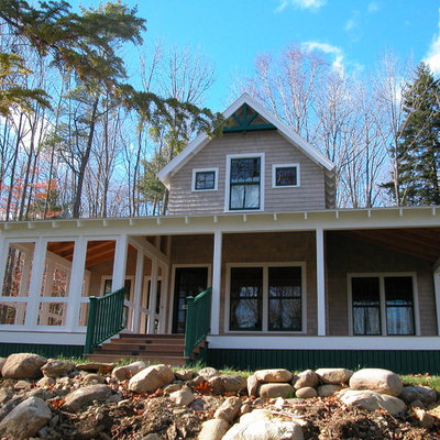 Mid-sized elegant two-story wood exterior home photo in Portland Maine