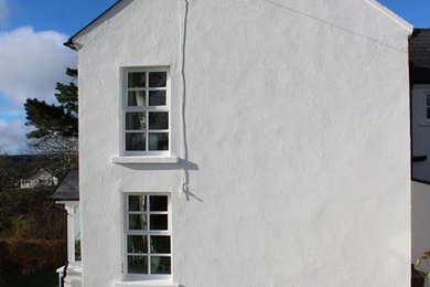 Design ideas for a farmhouse house exterior in Cork.