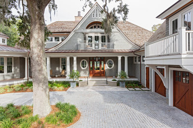 Example of a transitional exterior home design in Charleston