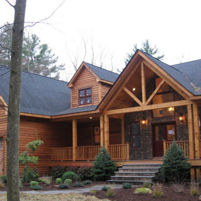 Mid-sized craftsman brown two-story mixed siding exterior home idea in New York with a shingle roof
