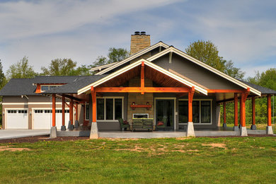 Example of a large classic gray one-story mixed siding gable roof design in Seattle