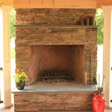 Covered Deck with Built-In Stone Fireplace