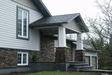 Example of a classic exterior home design in Ottawa
