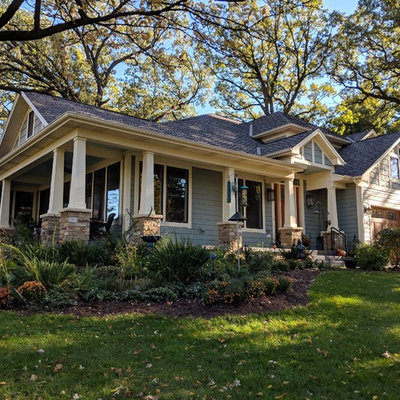 Mid-sized craftsman blue two-story mixed siding exterior home idea in Chicago with a shingle roof