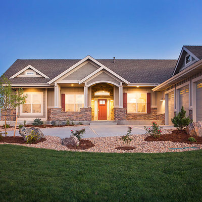 Example of a mid-sized arts and crafts gray one-story mixed siding gable roof design in Denver