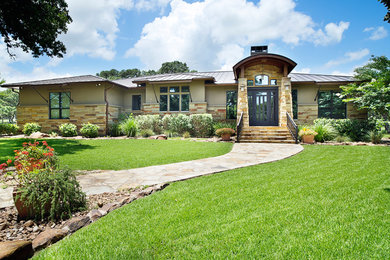 Example of an arts and crafts exterior home design in Austin