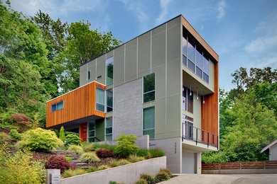 Modern wood exterior home idea in Seattle
