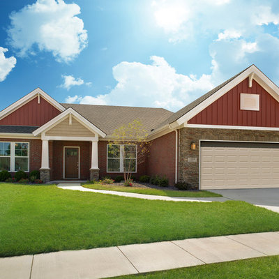 Example of a small arts and crafts red one-story mixed siding exterior home design in Other