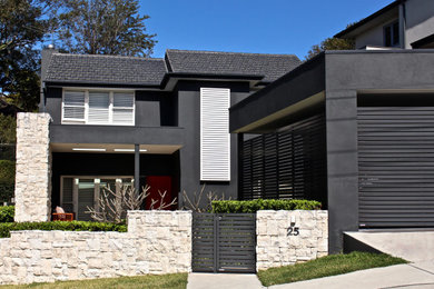 Modelo de fachada de casa actual con revestimiento de ladrillo, tejado plano y tejado de metal