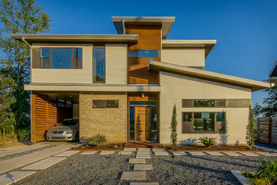 Example of a mid-sized trendy exterior home design in Austin
