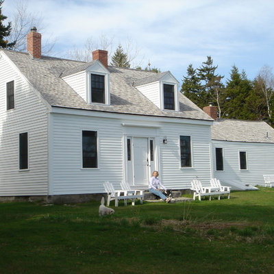 Mid-sized farmhouse white two-story wood gable roof photo in Portland Maine