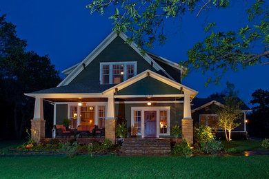 Large craftsman green two-story mixed siding exterior home idea in Oklahoma City