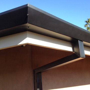 Custom cut Downspouts with contemporary Rain Gutters in Costa Mesa