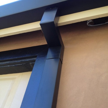 Custom cut Downspouts with contemporary Rain Gutters in Costa Mesa