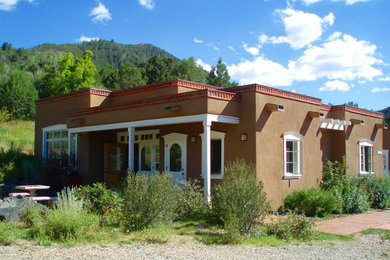 Example of a southwest exterior home design in Albuquerque