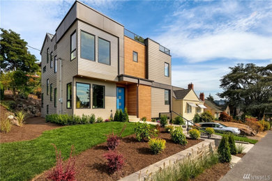 Inspiration for a contemporary two-story exterior home remodel in Seattle