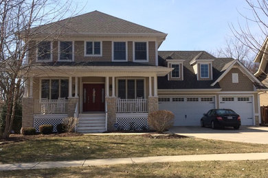 Example of an arts and crafts exterior home design in Chicago