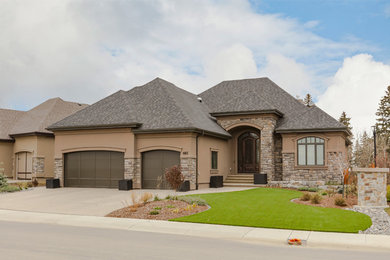 Example of a transitional exterior home design in Edmonton