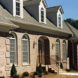 Example of a large classic two-story brick exterior home design in Atlanta