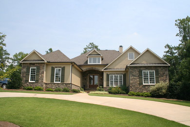 Inspiration for a huge craftsman beige two-story mixed siding exterior home remodel in Atlanta
